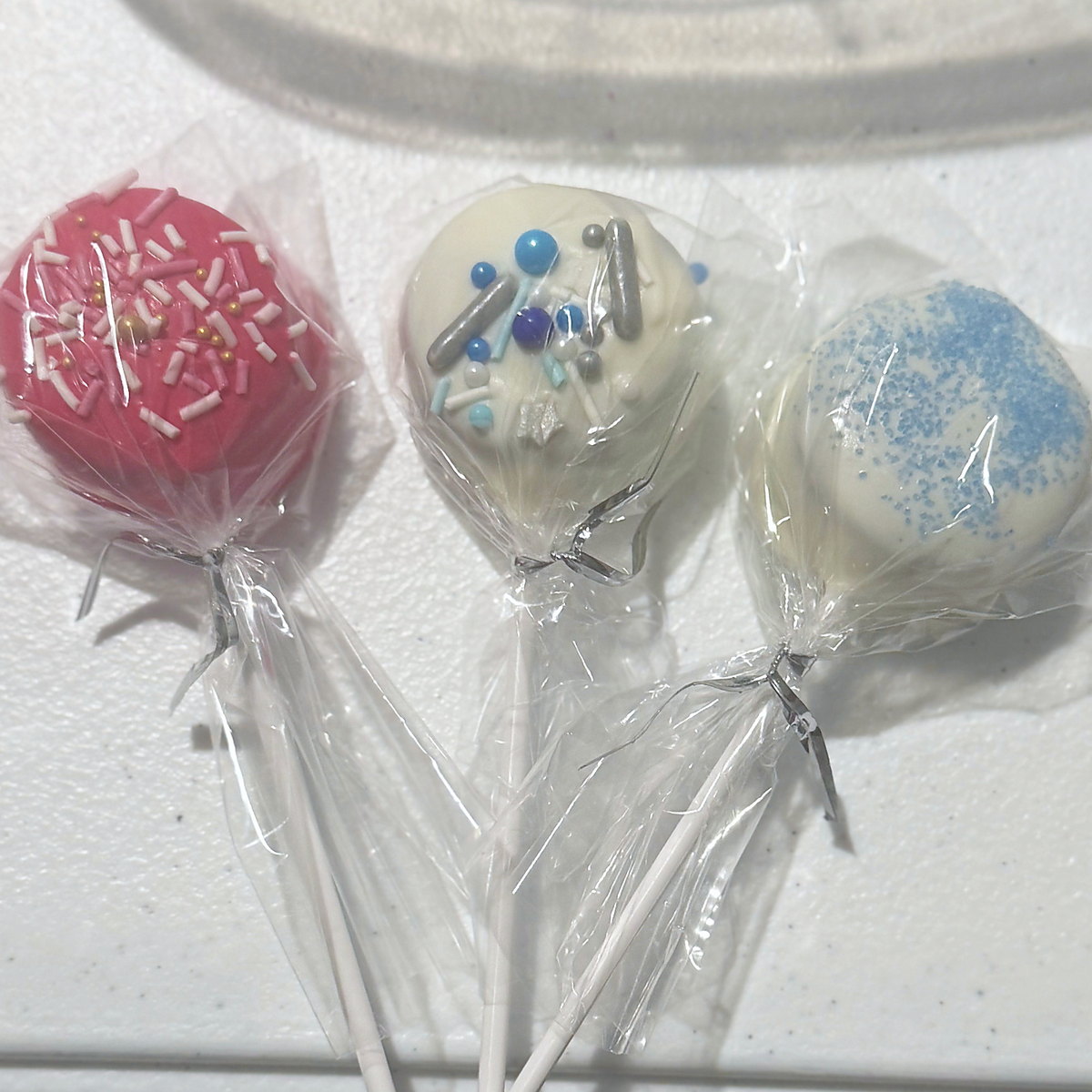 Blue, white and pink cake pops