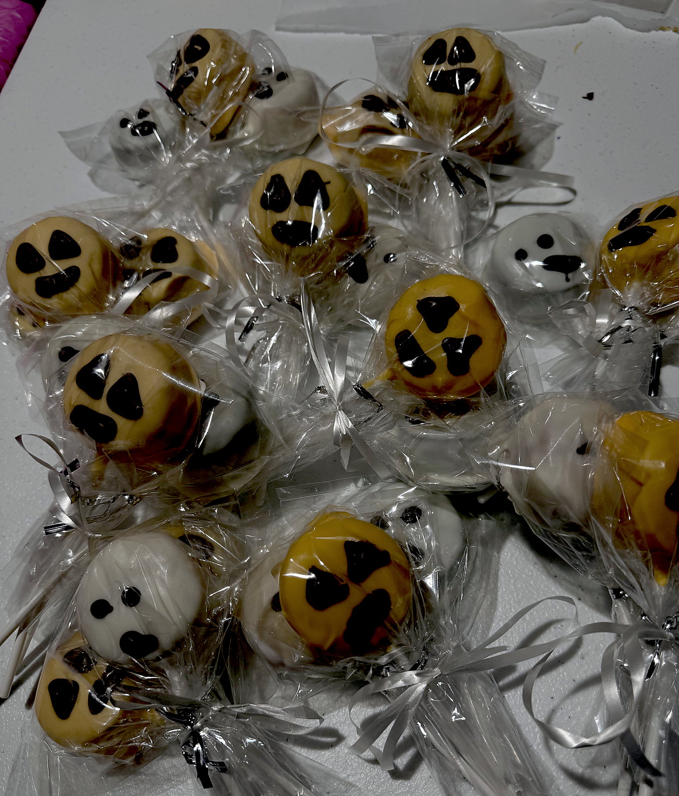 Halloween ghost and pumpkin cake pops, wrapped